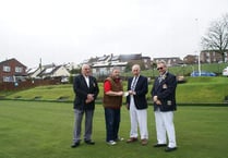 Bowlers’ cheque for air ambulance