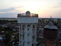 Property developer settles bill over work on historic towers