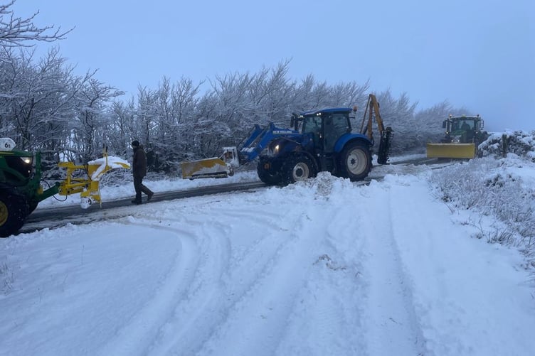 Contractors clearing a road on Exmoor