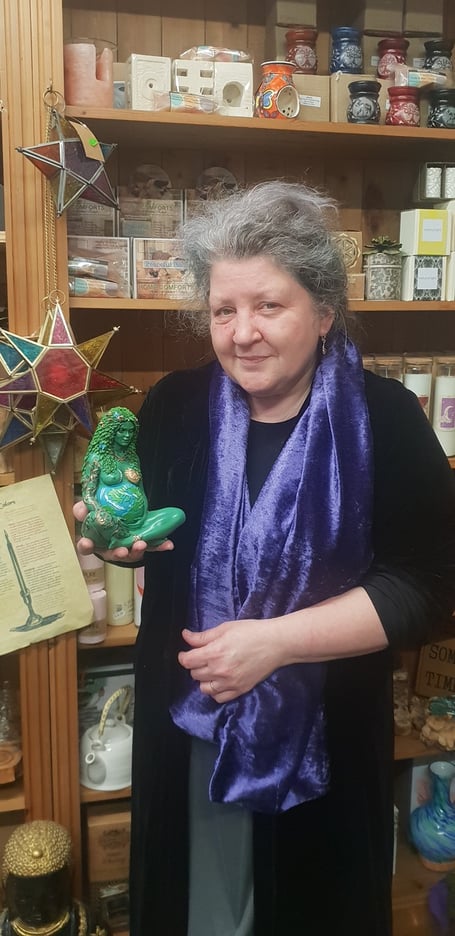 Nurtured by Nature owner Stacy Faulkner with a similar ‘Mother Earth’ figurine
