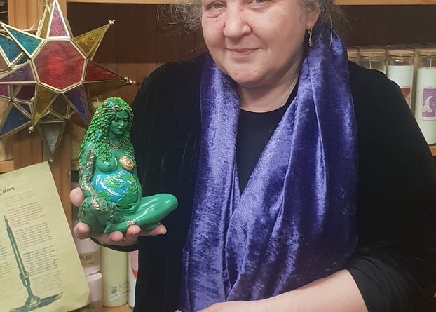 Nurtured by Nature owner Stacy Faulkner with a similar ‘Mother Earth’ figurine

