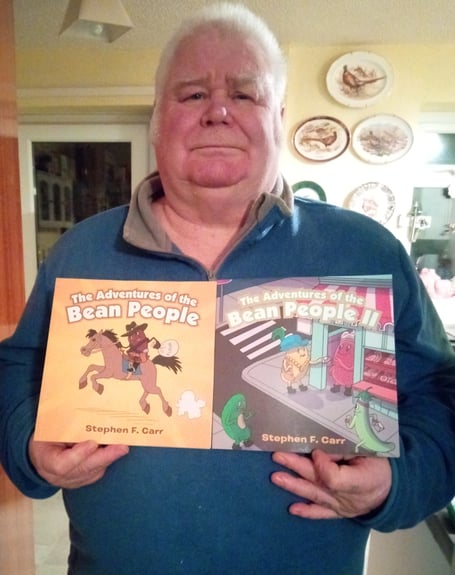 Steven Carr displays the Adventures of the Bean People 