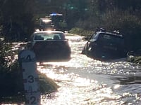 LIVE UPDATES: Firefighters at scene as cars stranded on flooded road