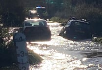 LIVE UPDATES: Firefighters at scene as cars stranded on flooded road