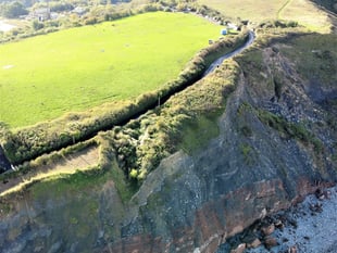 Traders warned of 'disaster' if cliff road stays shut for a year