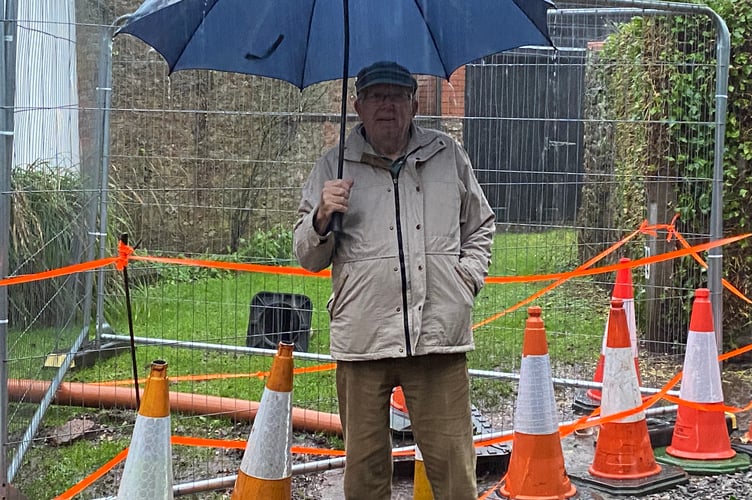 Mr Donnely pictured by the open drain