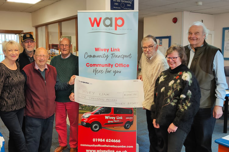 Wiveliscombe Rotary Club presents the Wivey Link with a £1000 donation