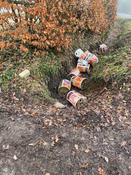 Cooking oil cans dumped by the roadside