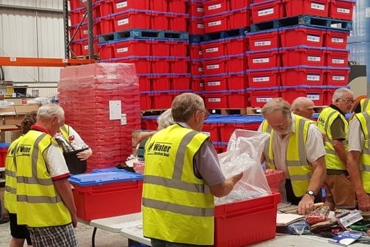 Rotarians at the Water Survival Box distribution centre.