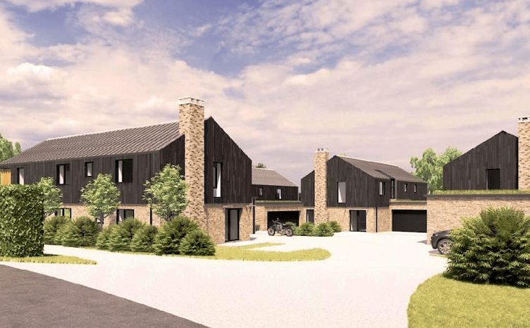 Artist’s impressions of what the four-home development would look like
