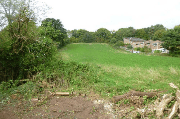Uffculme fake chimneys planning Mid Devon parish council housing