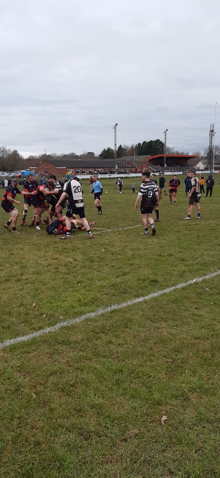 Jack Dyer powers towards the Wells try line.
