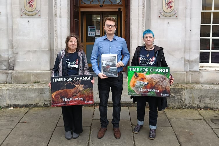 League Against Cruel Sports public affairs officer Jac Freeman, centre, and League campaigners, handing in the letter and report at County Hall in Taunton on Friday