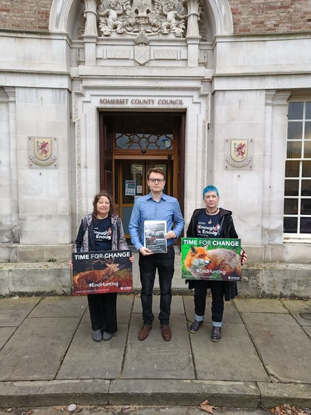 League Against Cruel Sports public affairs officer Jac Freeman, centre, and League campaigners, handing in the letter and report at County Hall in Taunton on Friday