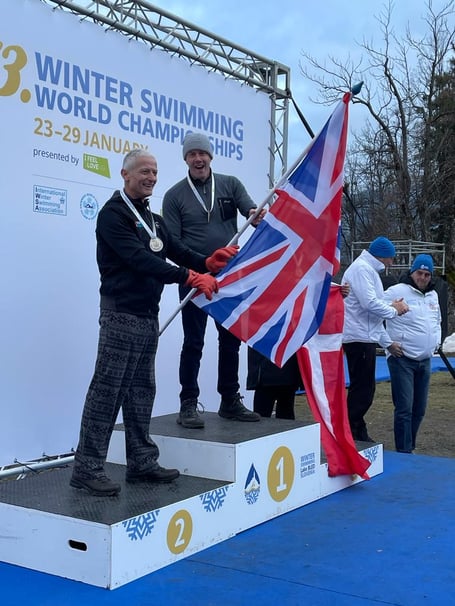 Guy Burt takes to the podium of the Winter Swimming World Championships 