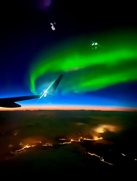 SEE SWNS STORY SWNAauroraplane --- A delayed flight meant a jaw-dropping display of the northern lights for an Essex photographer. Paul Botten, 50, found his journey home from Norway delayed on Thursday (23 Feb), but the resulting night flight meant a stunning show of aurora. He managed to snap the vibrant colours on his iPhone at 30,000ft.
