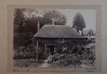 Mystery of thatched cottage photograph