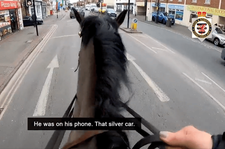Body cam footage shows the moment police spot a driver in the oncoming lane using his phone