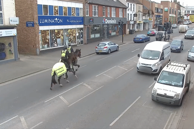 Mounted police pursue a driver down East Reach in Taunton