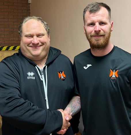 Man-of-the-match for Wellington Reserves was Luke Perry and he is pictured with the team’s kit man Adrian Ridgeway, who sponsored the match ball for the game.