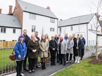Residents celebrate after construction of 42 new affordable homes 