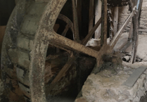 Medieval manor water wheel being restored 