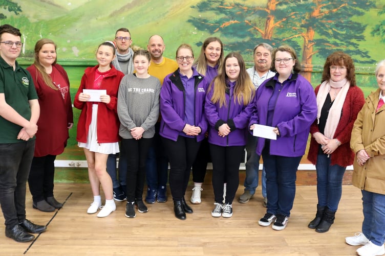 Cheque recipients with Carnival officers.jpg
