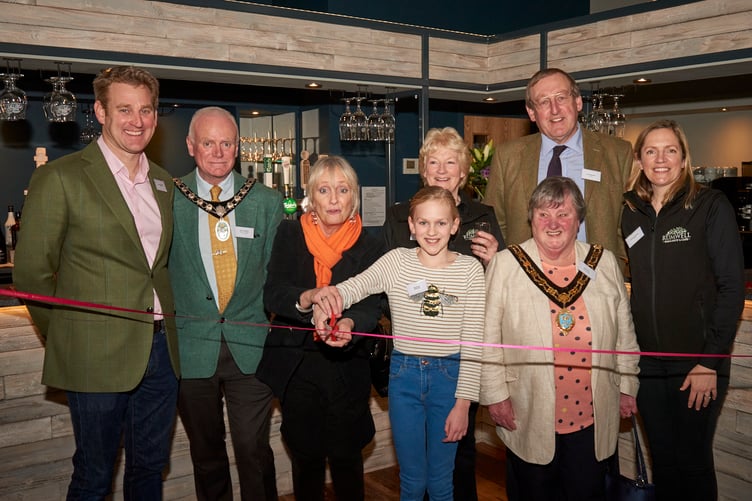 Left to right: James Mitchell, Mayor of Wellington Town Council, Councillor Mark Lithgow, Lesley Waters, Anne and David’s granddaughter, Elizabeth Mitchell (front), Anne Mitchell, Mayor of Taunton, Councillor Sue Lees (front), David Mitchell, Sophie Mitchell.