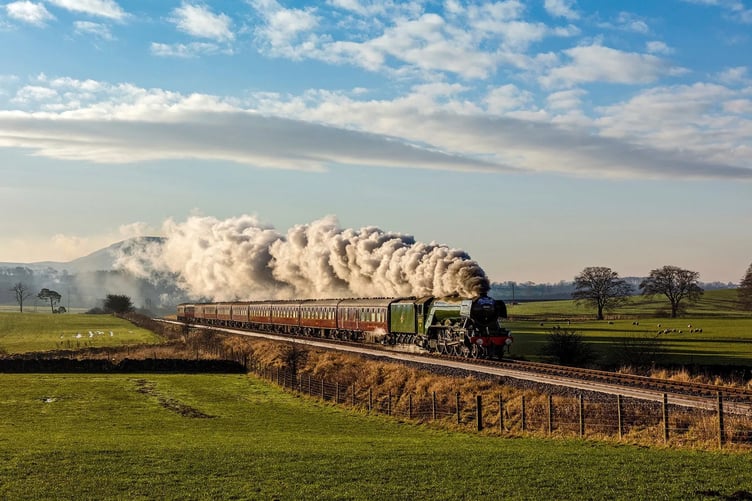 Flying Scotsman steam locomotive passing through Wellington