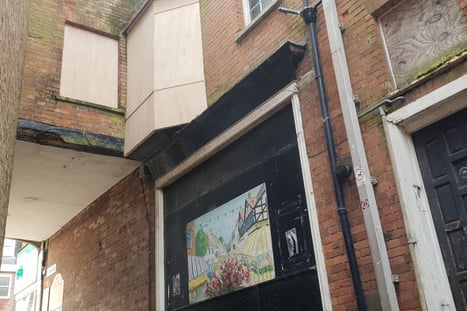 Cornhill has been reopened after it was forced to close because of falling rubble