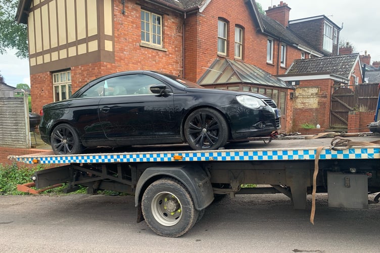 This black Mercedes car was seized by police for being parked on a road in wellington without insurance.