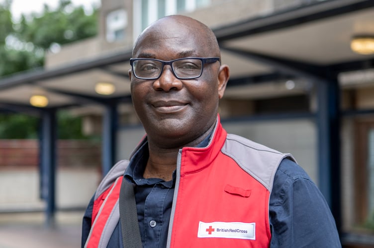 Daniel, a Support at Home support worker, outside Fanny's home. Kennington, London