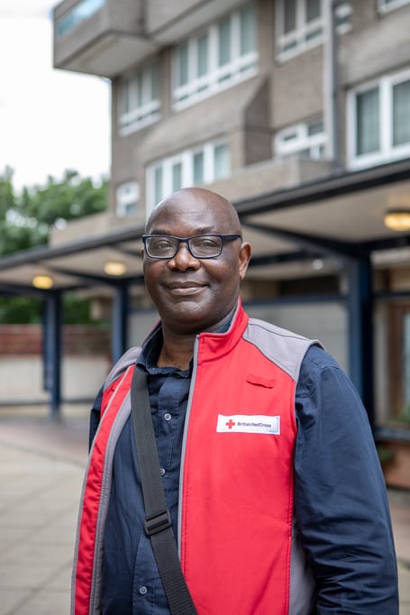 Daniel, a Support at Home support worker, outside Fanny's home. Kennington, London