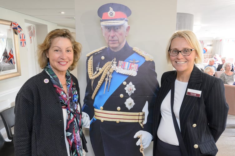 MP Rebecca Pow (left) withJo Ridehalgh and 'King Charles'. by Theo Moye 05/05/23 Churchill Retirementy Living hold a party for prospective and current residents of Riverain Lodge, Taunton, celebrating King Charles II Coronation.