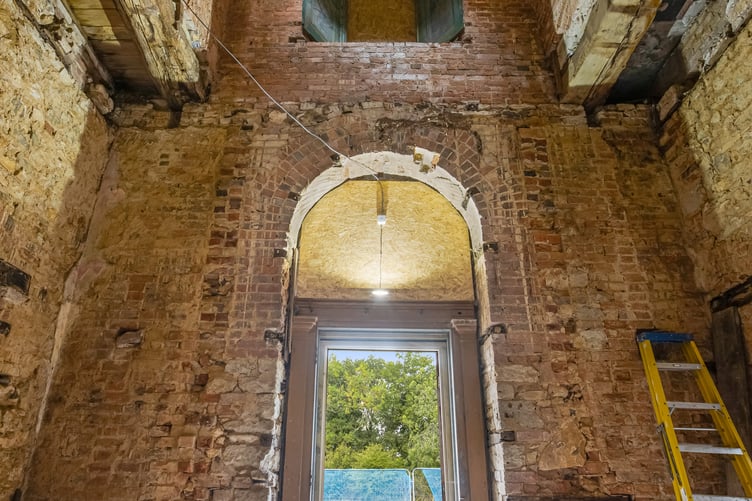 Blackborough House in the Blackdown Hills, on the Somerset-Devon border. See SWNS story SWLNderelict. The opportunity to restore a crumbling architectural gem in Devon is up for grabs for just under £1.5 million.Despite its grand façade, the Grade II Listed country mansion was never completed and is currently derelict and in need of a complete renovation.Blackborough House has 14-bedrooms, 15 bathrooms and nine reception rooms, and was designed to be an Italianate palace.It is nestled in Blackdown Hills, which spreads along the border between Somerset and Devon and has been named an Area of Outstanding Natural Beauty.