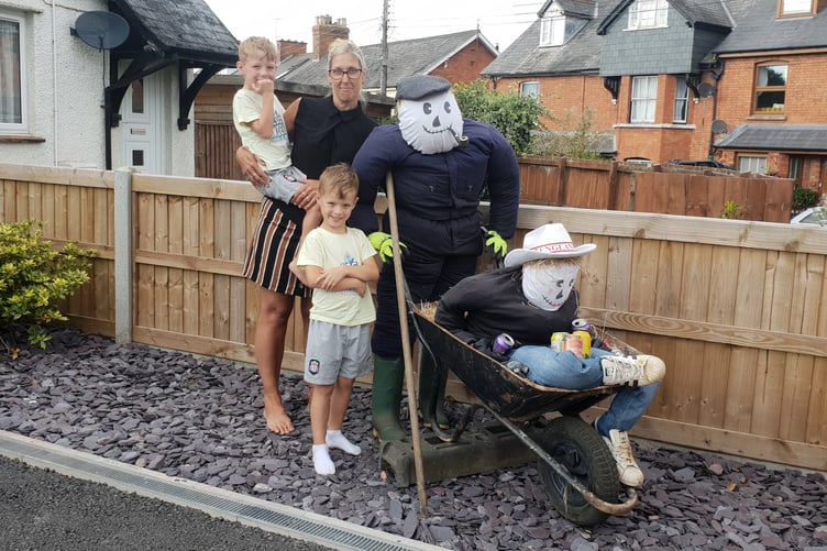 Lisa Holcombe and her sons, of Greenway Road, Rockwell Green, won last year's first-ever scarecrow competition.