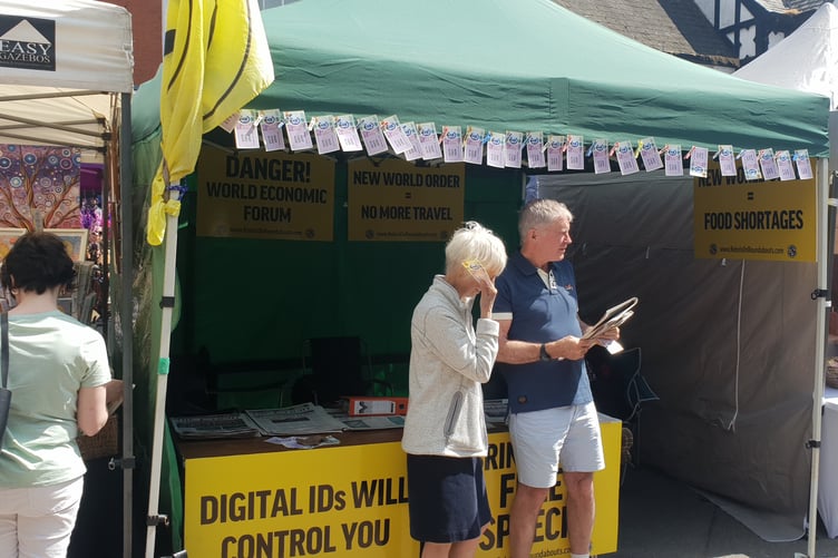 Anti-vaxxers manning a stall at Wellington Street Fair.