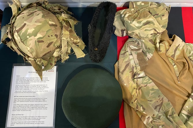 Visitors to the exhibit are welcome to try on various pieces of kit on show