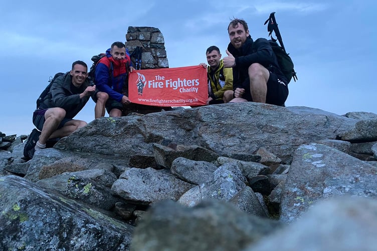 The four fire fighters from Devon and Somerset Fire and Rescue scaled 15 peaks in a day