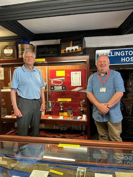 Museum curator Colin Spackman and town clerk Dave Farrow pictured proudly in front of the gifted silver bugle