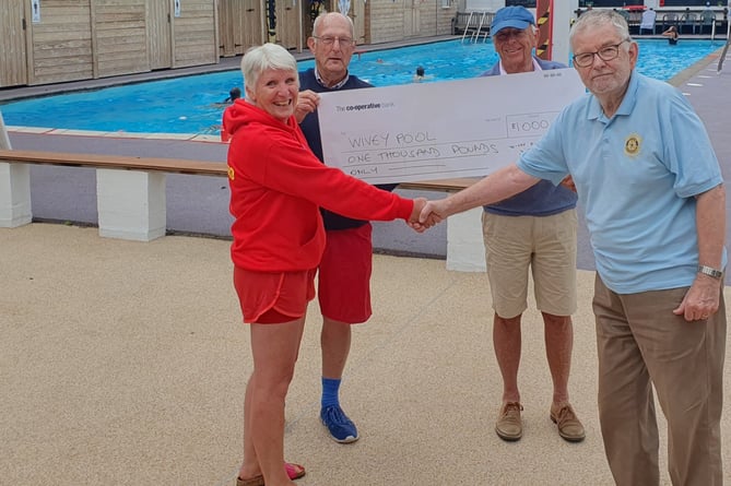Wiveliscombe Rotary Club donated £1000 to the pool ahead of the 'switch on' 