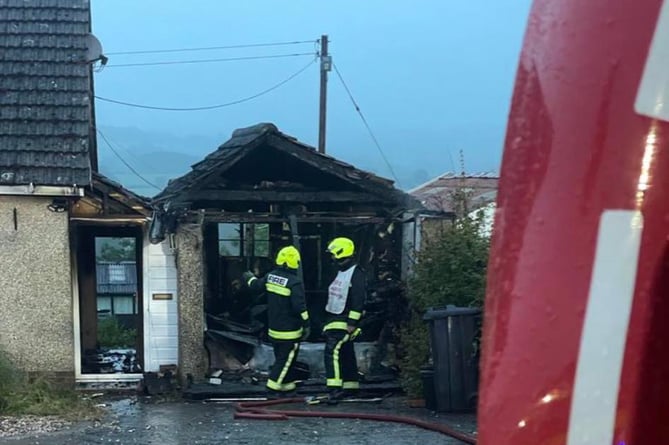 Wellington crews on the scene after a tumble dryer set a garage alight