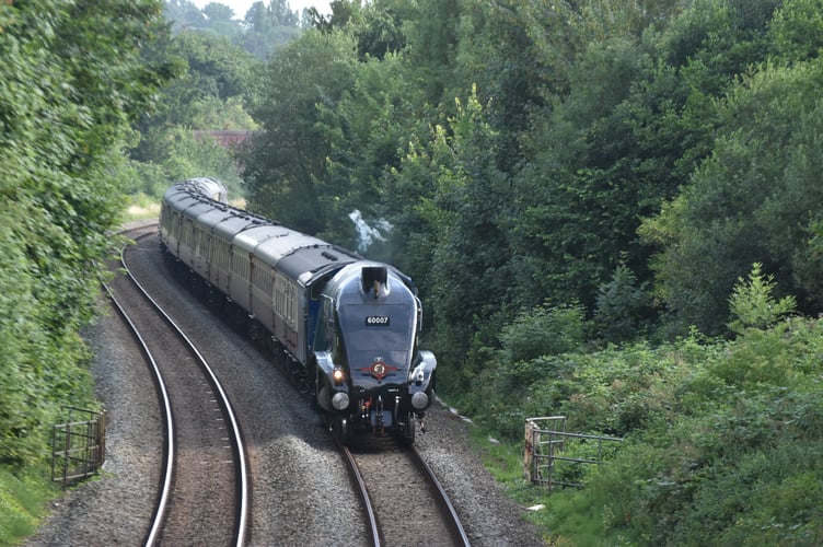 The Sir Nigel Gresley steam locomotive returning through Wellington.