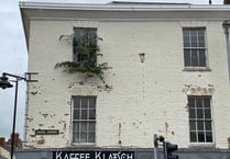 Weeds begin to grow from High Street property 