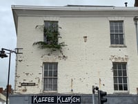 Weeds begin to grow from High Street property 