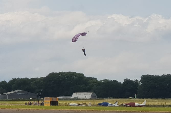 A parachutist landing at Dunkeswell Aerodrome.
