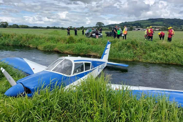The downed Dunkeswell Piper Cherokee lies in the River Axe light aircraft crash