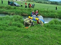 Aircraft crash lands in river