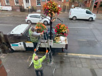 Weeds rooted out of town centre hanging baskets