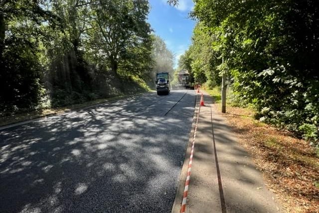 The last of the Mantle Street and Hilly Head surface material being rolled in Wellington.